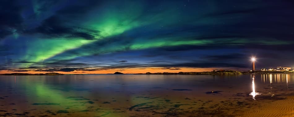 Northern Lights Lighthouse Glow by Roy Samuelsen — canvas wall art