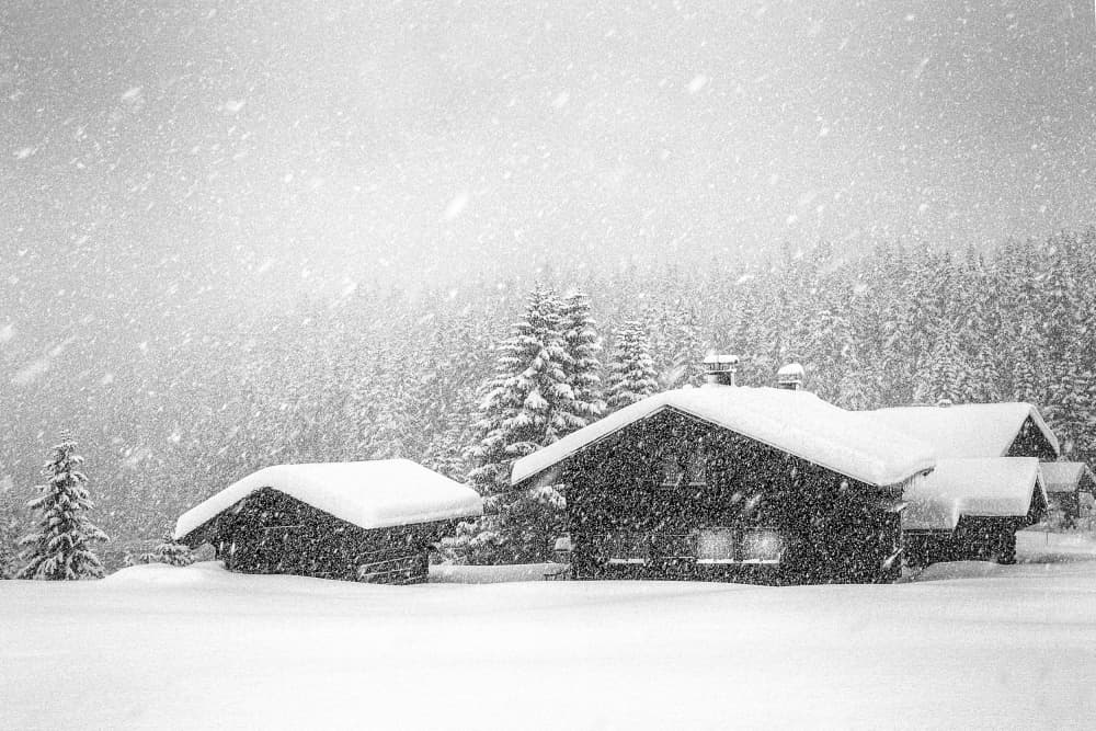 Falling Snow Chalets by Uschi Hermann — canvas wall art