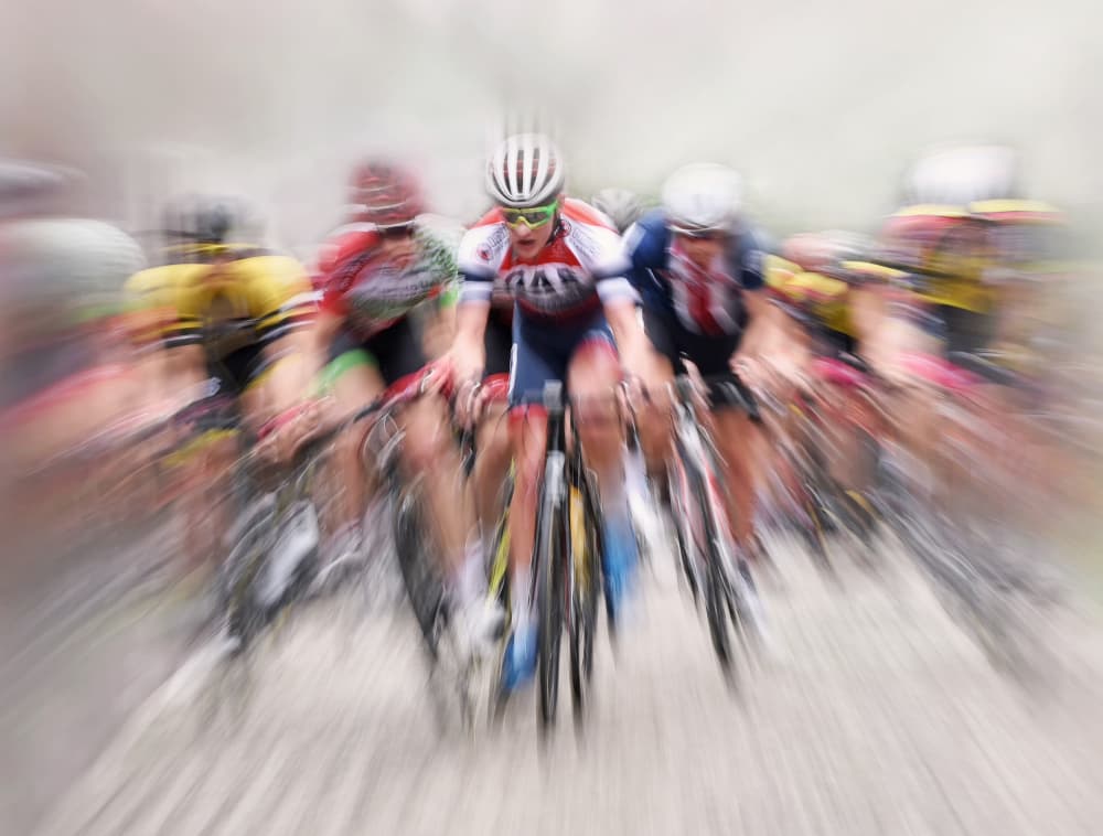 Speeding Cyclists by Lou Urlings — canvas wall art