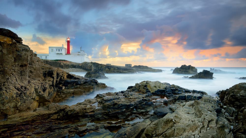Dramatic Coastal Lighthouse Sunset by Paulo Dias — canvas wall art