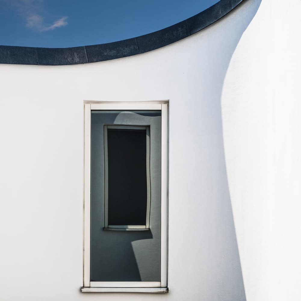Curved White Wall Window by Luc Vangindertael (laGrange) — canvas wall art