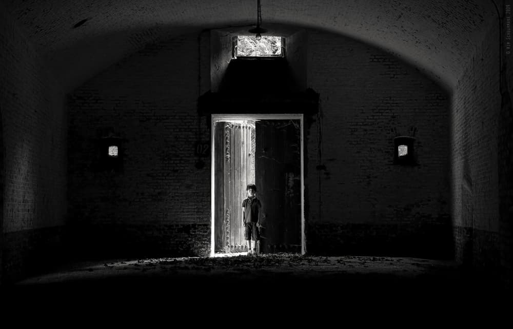 Solitary Figure Doorway Light by Wim Schuurmans — canvas wall art