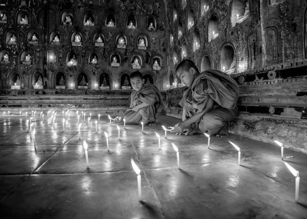 Monks Lighting Temple Candles by ADIREK M — canvas wall art