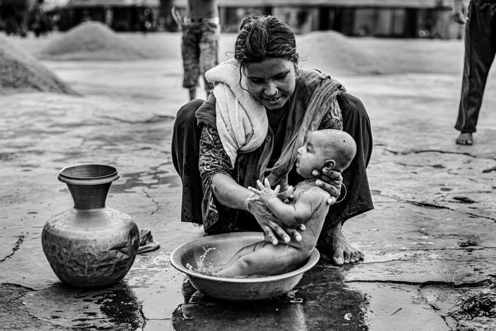 Tender Baby Bath by Rakibul Alam Khan — canvas wall art
