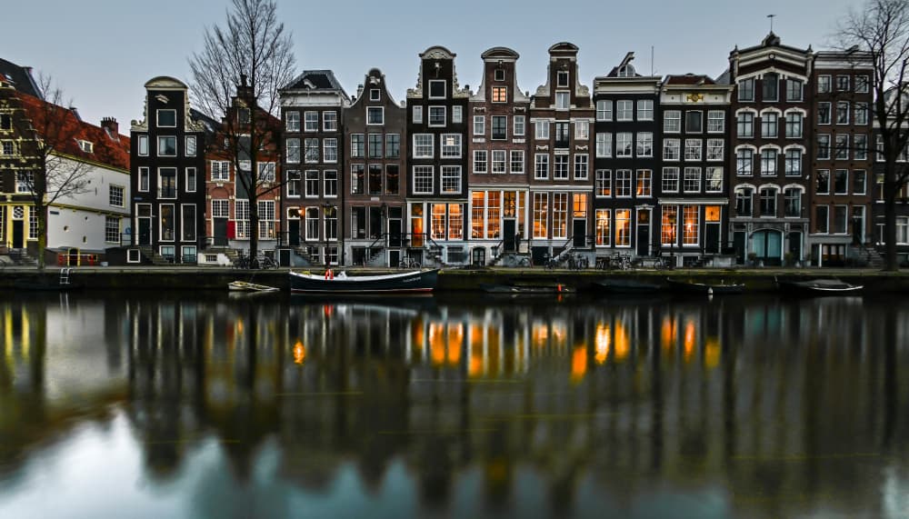 Amsterdam Canal Evening Reflections by wiebe wilbers — canvas wall art