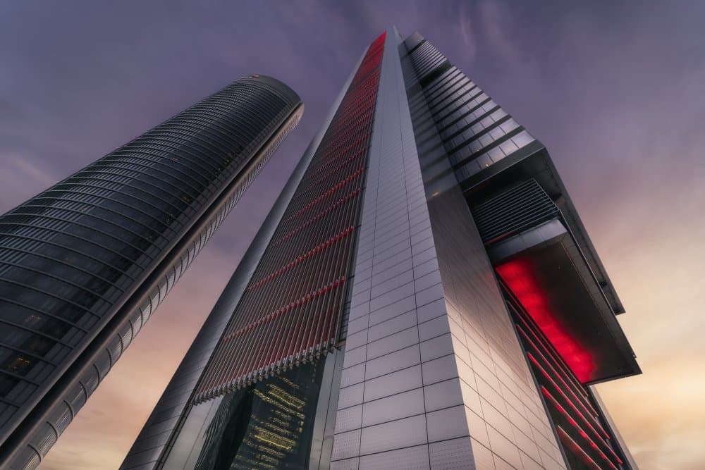 Red Lit Skyscrapers by Jorge Ruiz Dueso — canvas wall art