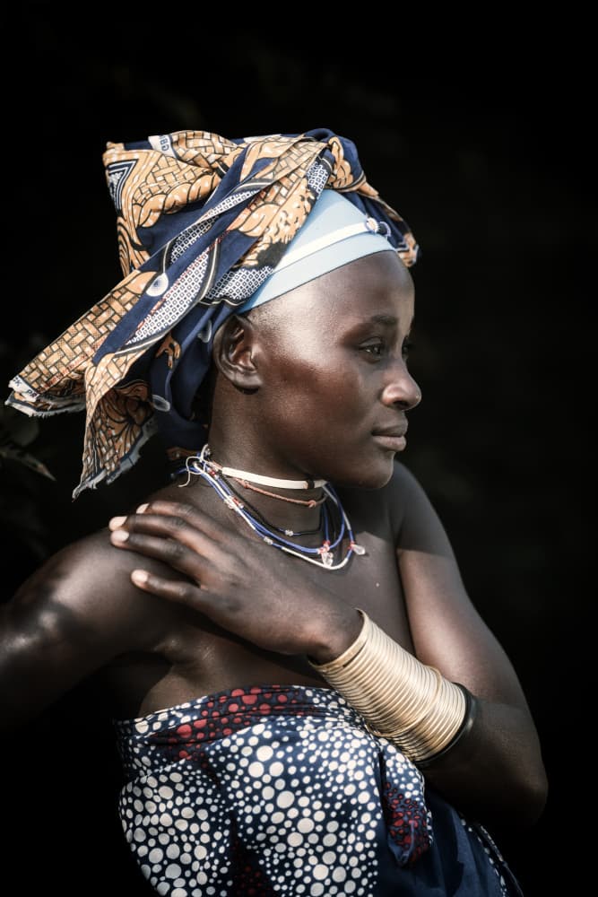 Elegant Woman in Headwrap by Trevor Cole — canvas wall art