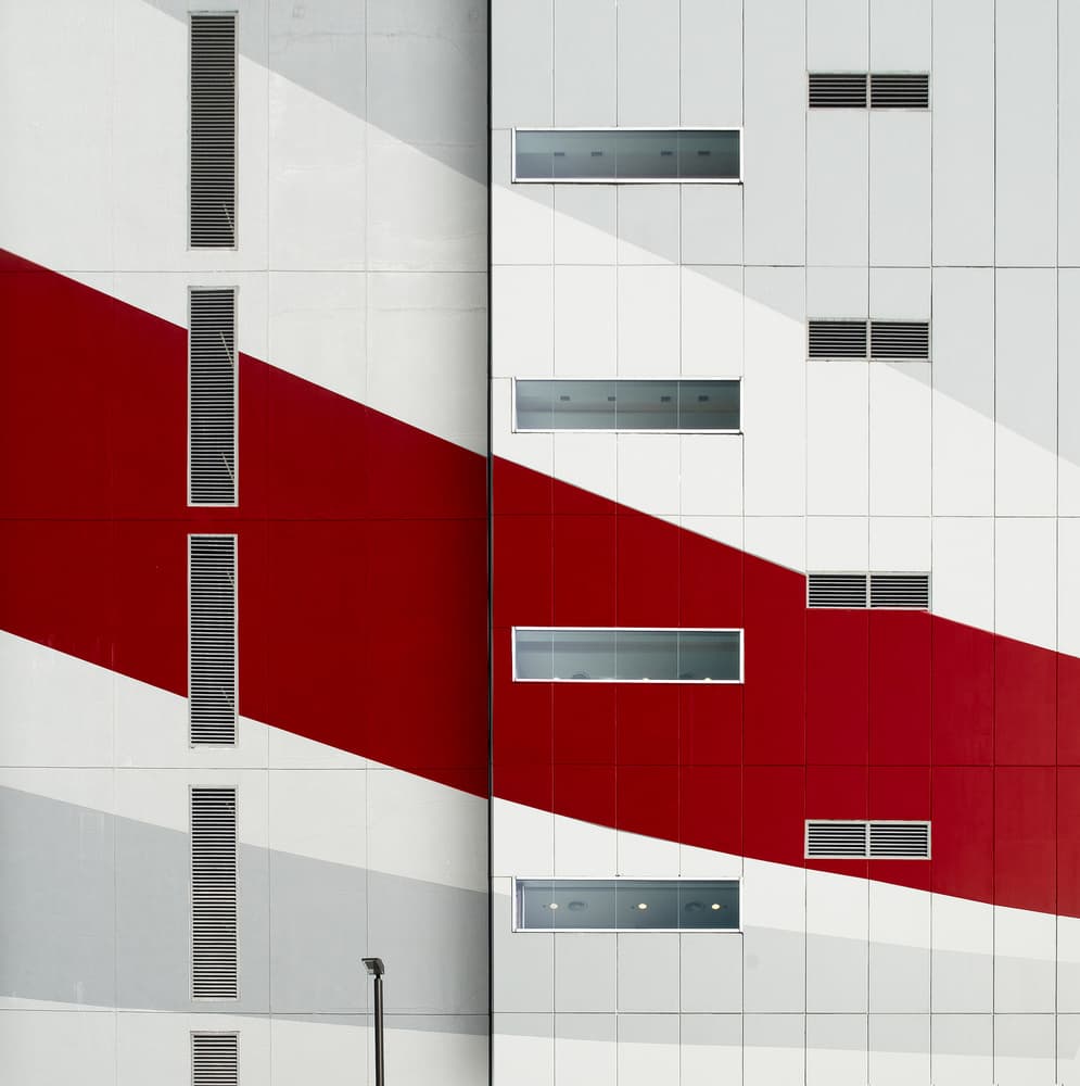 Red Stripe Building by Harry Verschelden — canvas wall art