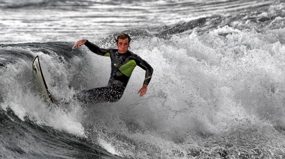 Surfer on Wave by Eyal Bussiba — canvas wall art