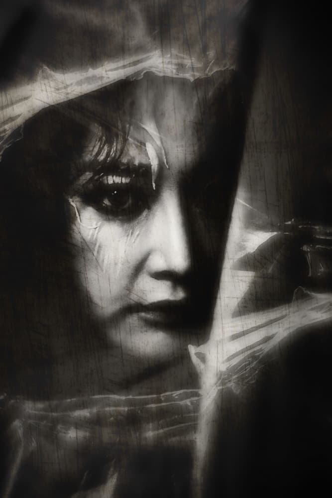 Pensive Woman's Gaze by cindy ahn — canvas wall art