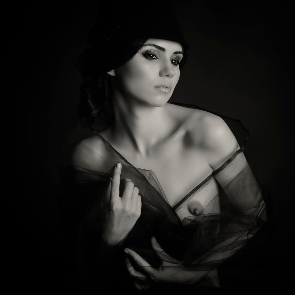 Mysterious Woman's Gaze by Alexandra Fira — canvas wall art