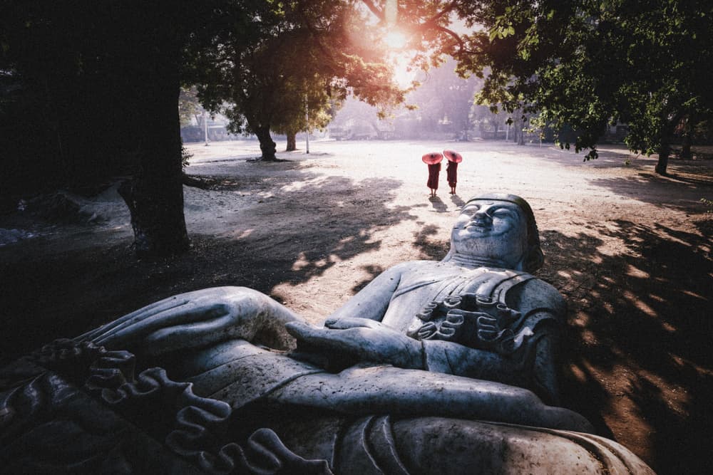 Peaceful Reclining Buddha by Woraphon Banchobdi — canvas wall art