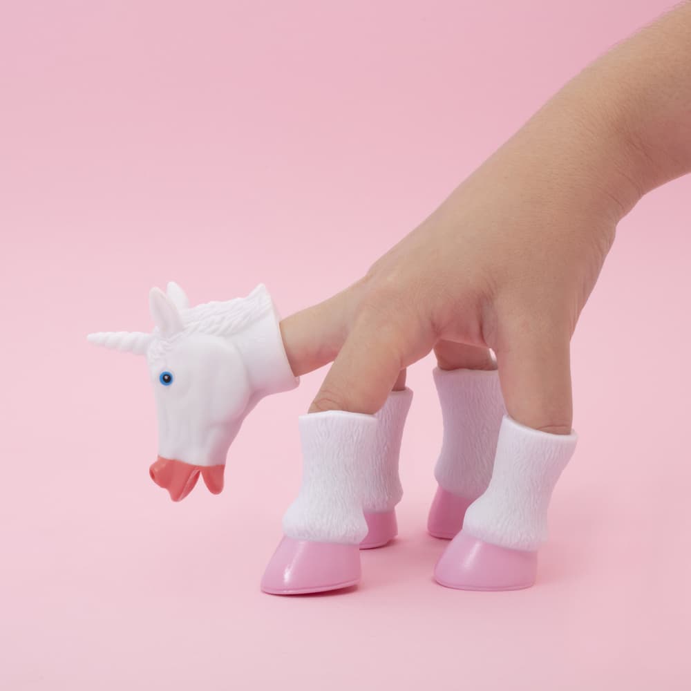 Whimsical Unicorn Hand by Julia Ramiro — canvas wall art