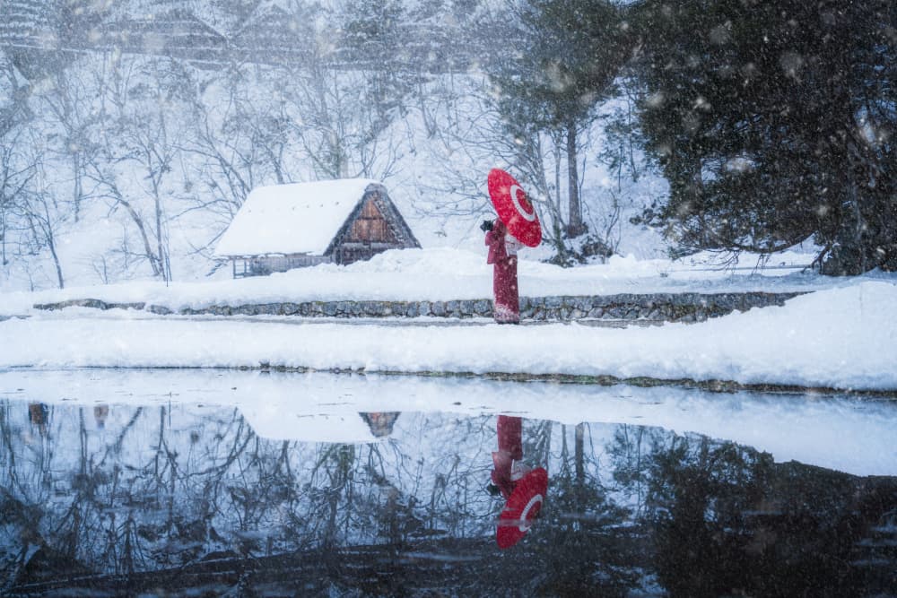 Red Umbrella Winter Reflection by Vu van quan — canvas wall art