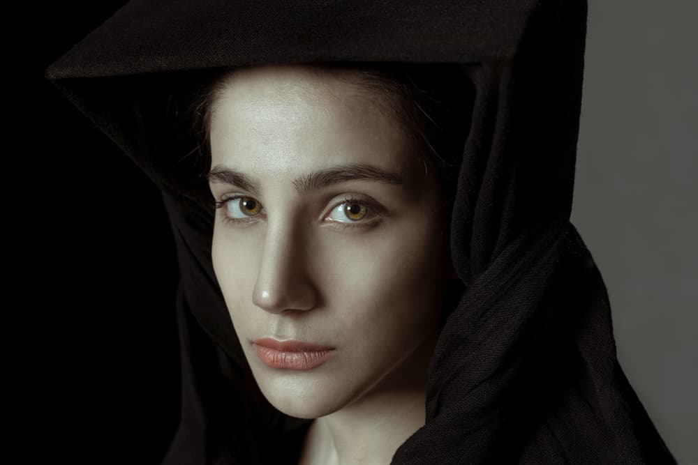 Mysterious Hooded Gaze by Parsa Bagheri — canvas wall art
