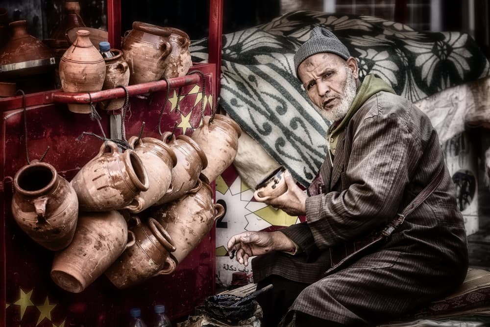 Market Pottery Artisan by Pavol Stranak — canvas wall art