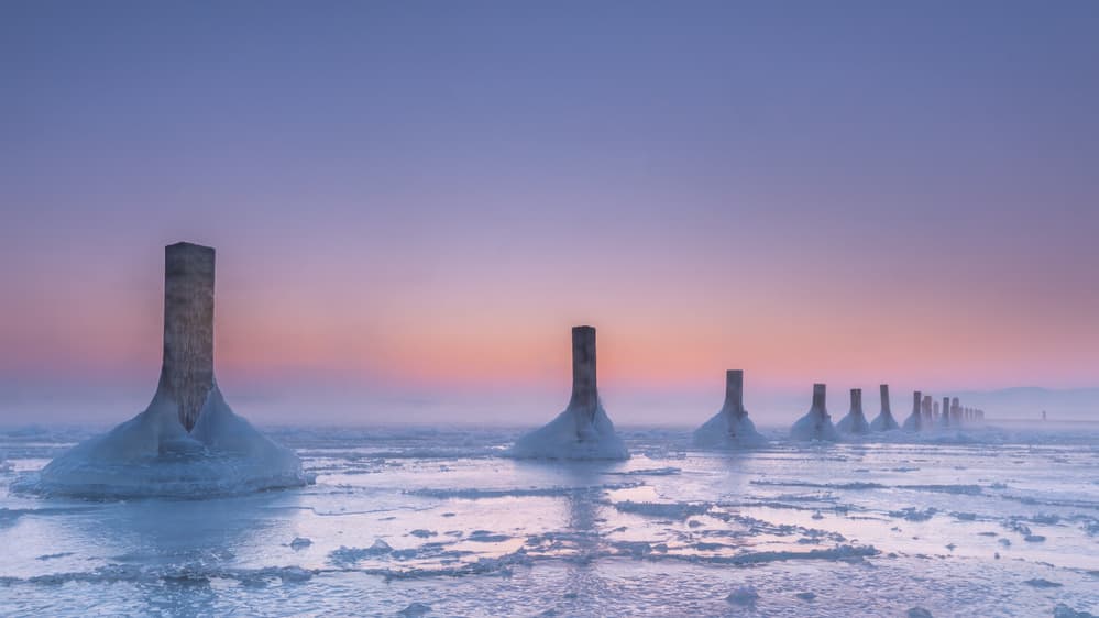 Icy Lake Pillars Dawn by Ulrike Eisenmann — canvas wall art
