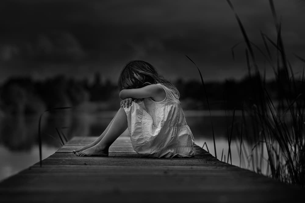 Pensive Girl on Dock by Christoph Hessel — canvas wall art