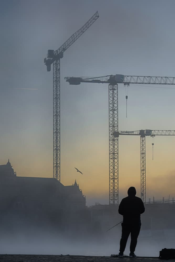 Misty Urban Fishing by Anna Niemiec — canvas wall art