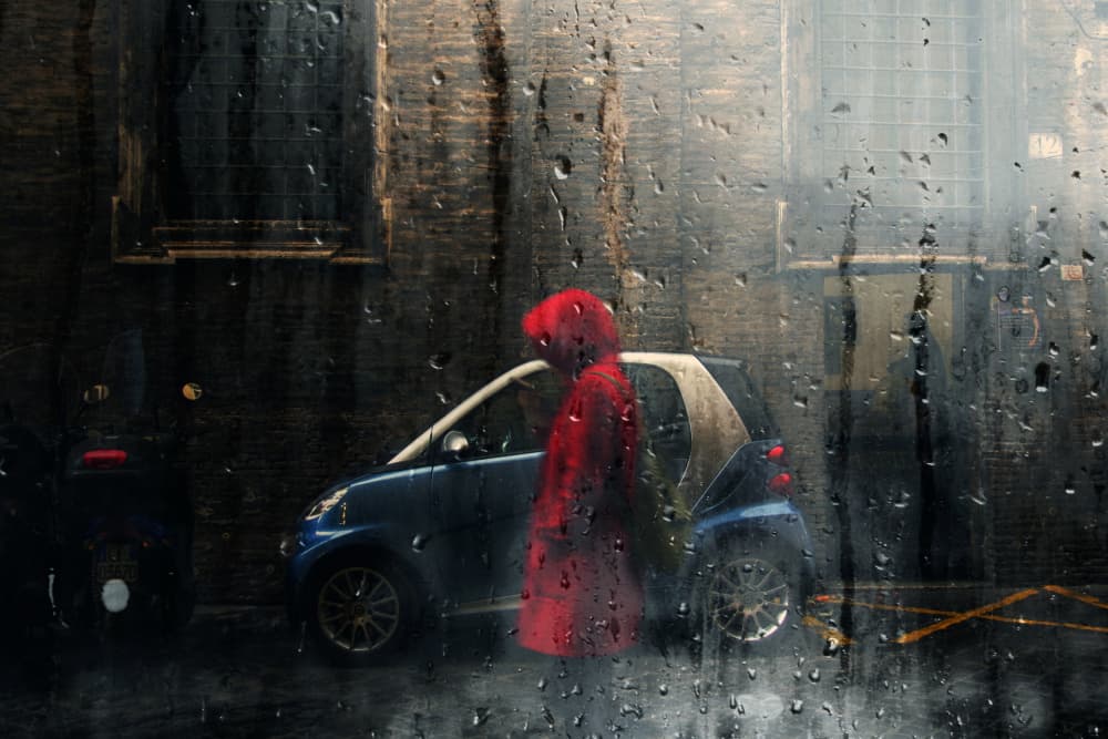 Red Coat In Rain by Alessio Trerotoli — canvas wall art