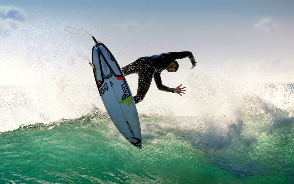Surfer Aerial Wave Ride by Luca Ulivi — canvas wall art