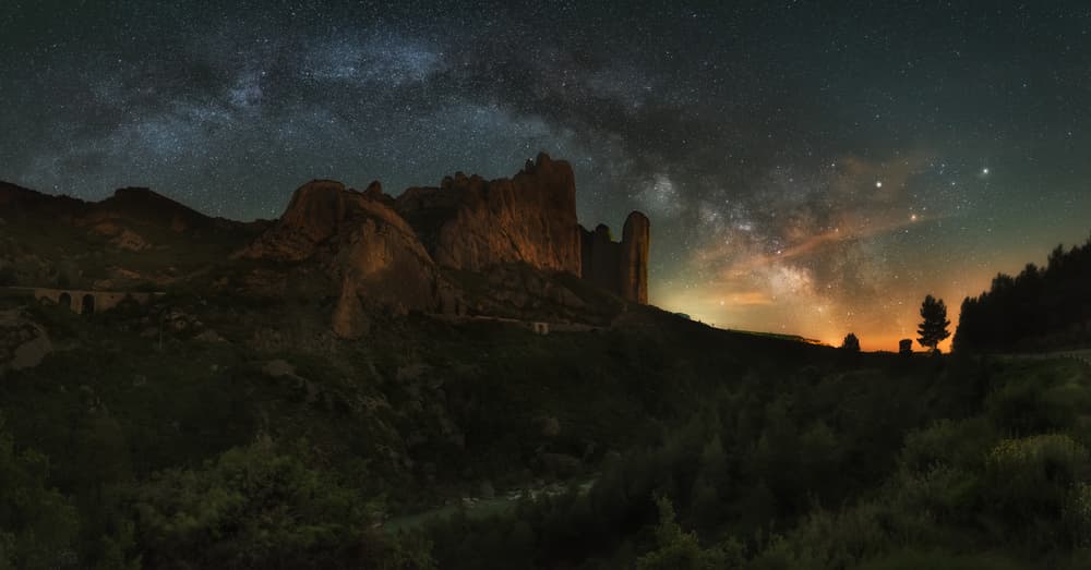 Milky Way Over Mountain Peaks by David Martin Castan — canvas wall art