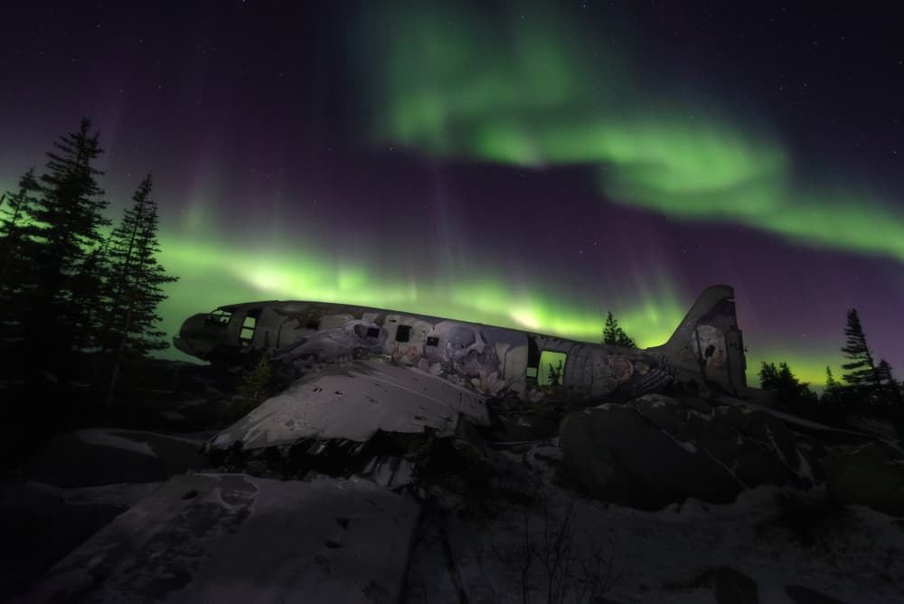 Aurora Plane Wreck by Junbo Liang — canvas wall art