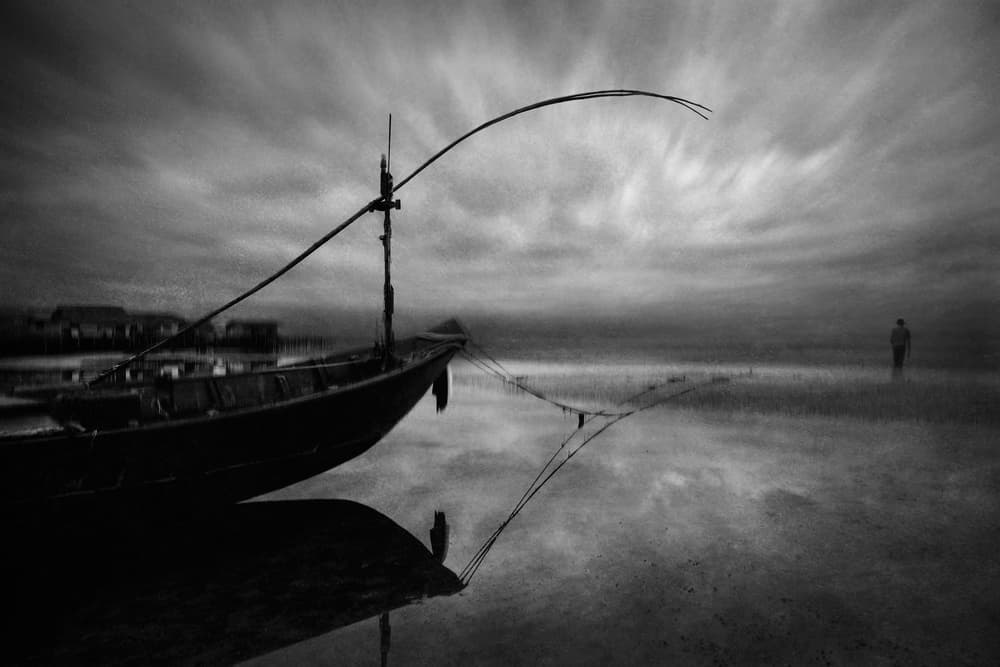 Solitary Boat Reflection by Ekkachai Khemkum — canvas wall art