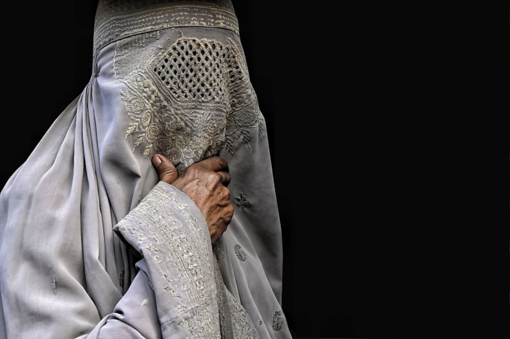 Traditional Veiled Woman by Irene Perovich — canvas wall art