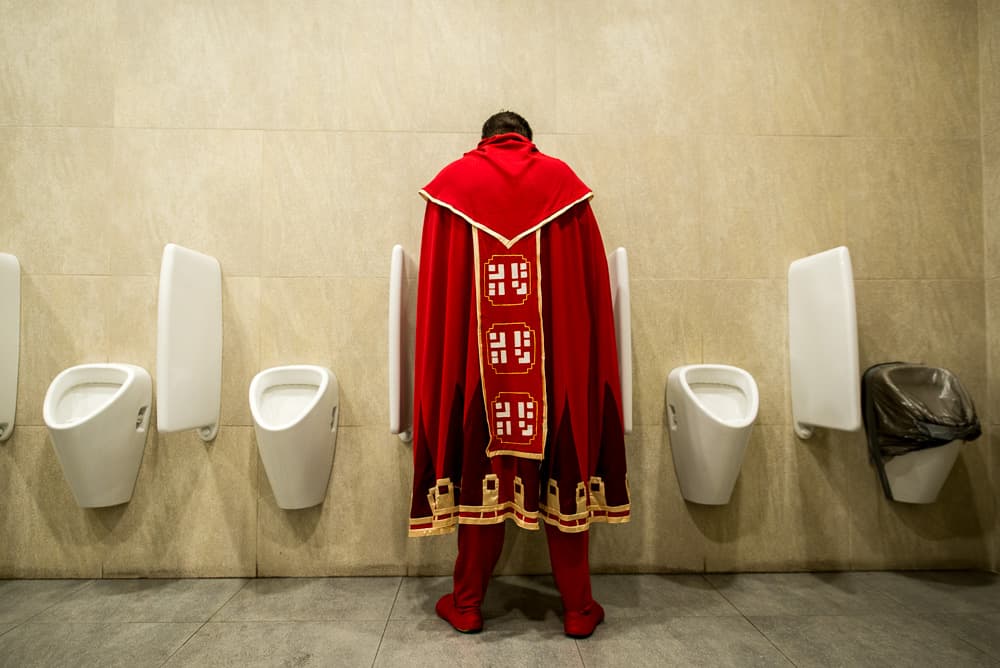 Red Robe Bathroom Humor by Oleg Dudko — canvas wall art
