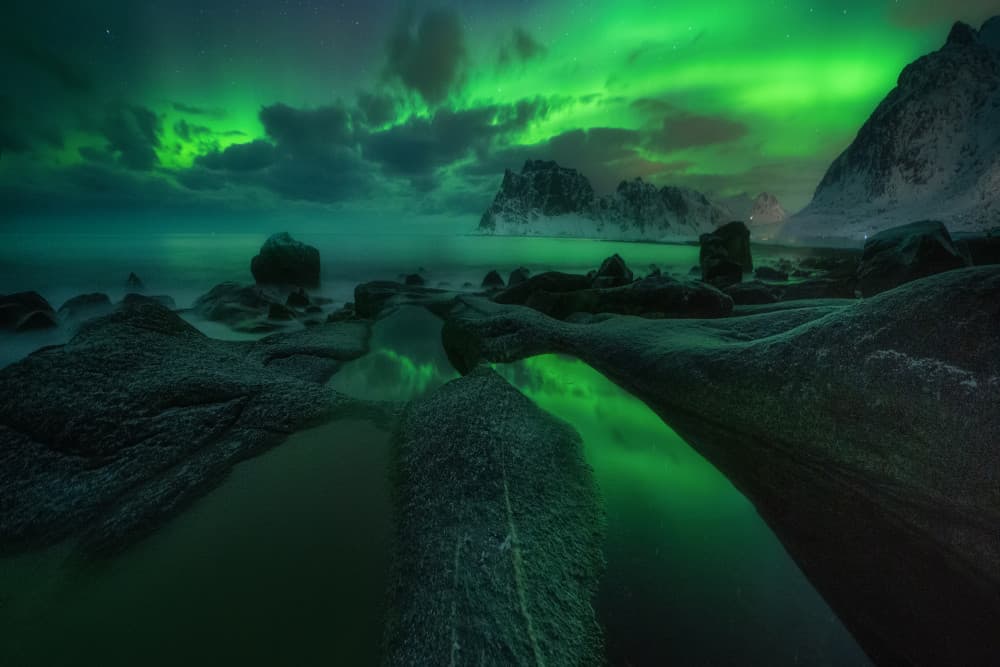 Green Aurora Coastal Reflection by Adam Pachula — canvas wall art