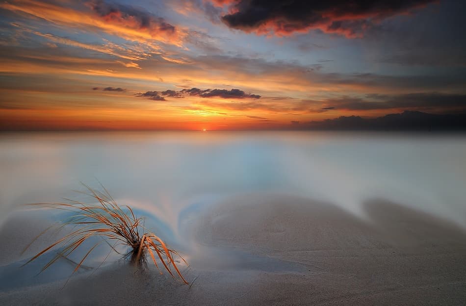 Tranquil Beach Sunset by paralaxa — canvas wall art