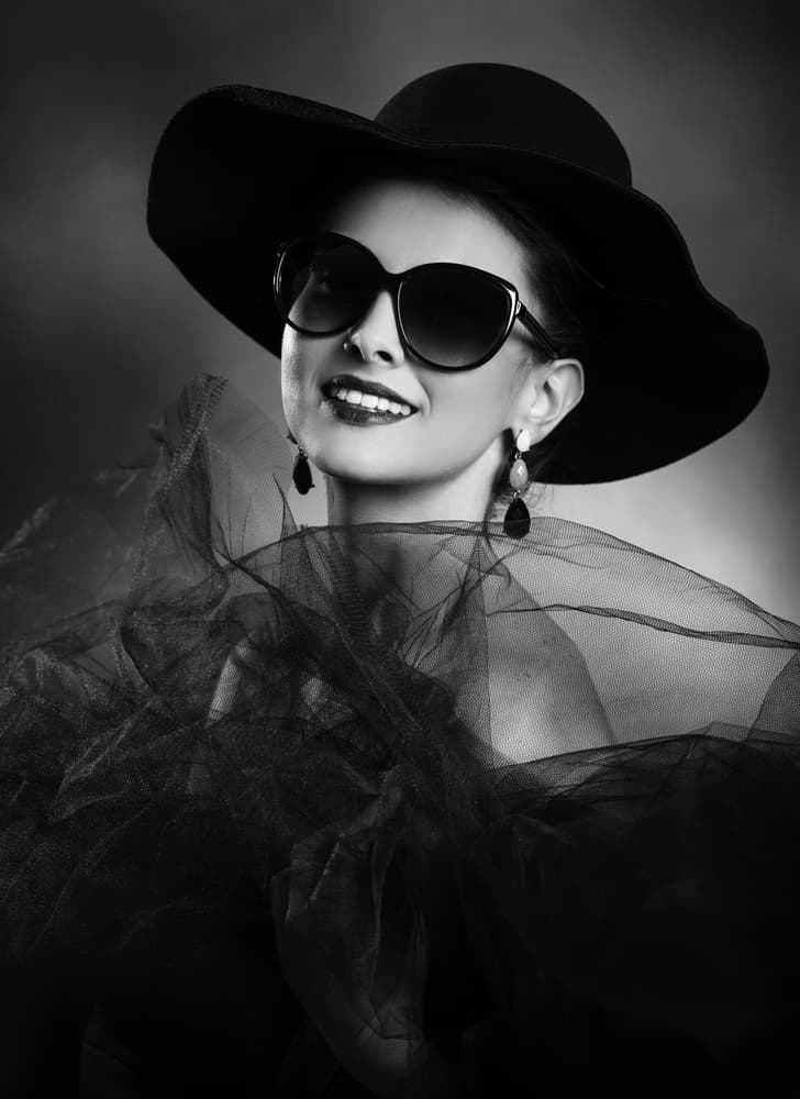 Elegant Woman Black Hat by Peppe Tambè — canvas wall art