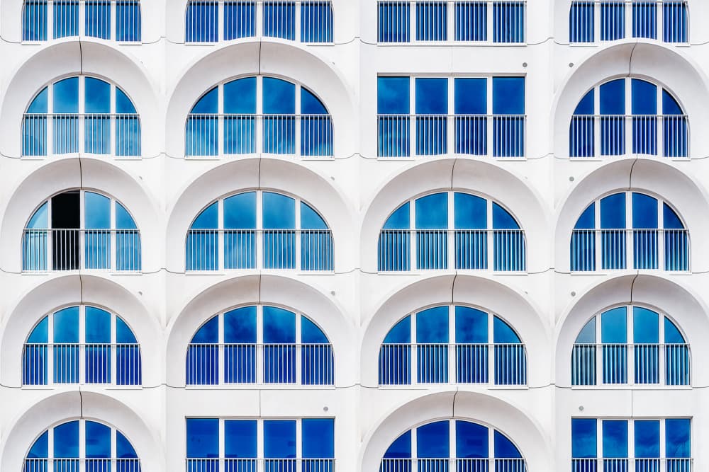 Blue Windows White Arches by Michael — canvas wall art