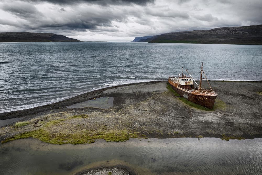 Rusty Shipwreck Shore by Þorsteinn H. Ingibergsson — canvas wall art