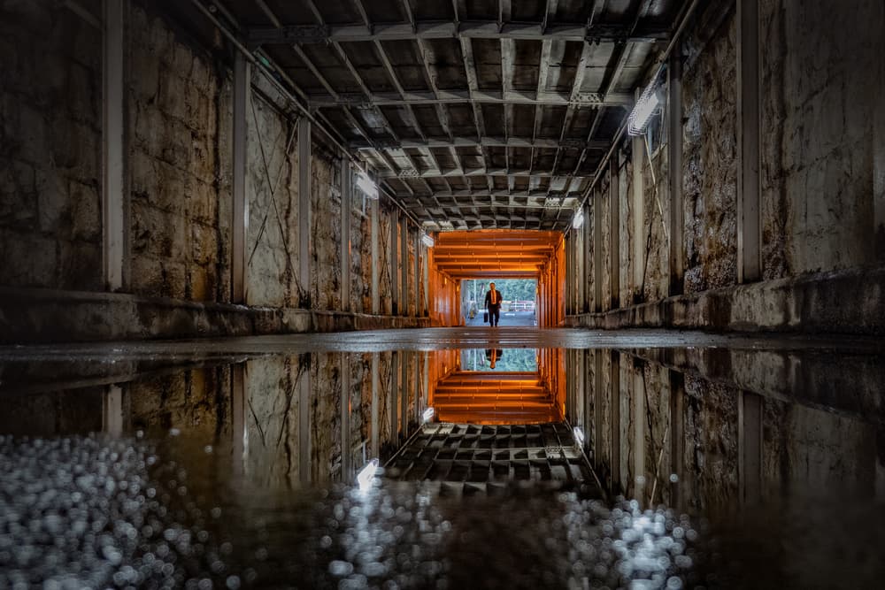 Lone Figure Tunnel Reflection by Haruyo Sakamoto — canvas wall art