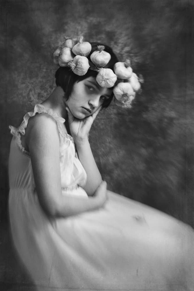 Pensive Woman Garlic Crown by Marius Cinteza — canvas wall art