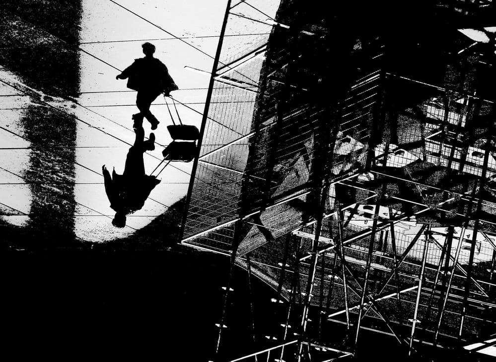 Urban Silhouette Traveler by Jian Wang — canvas wall art