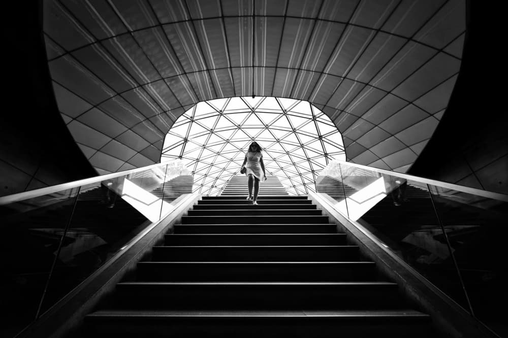 Woman Ascending Modern Stairs by Jorge Pimenta — canvas wall art