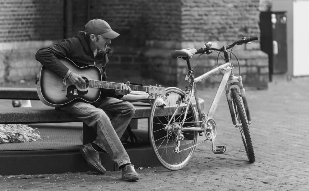 Street Guitar Serenade by Alexandra Isbasoiu — canvas wall art