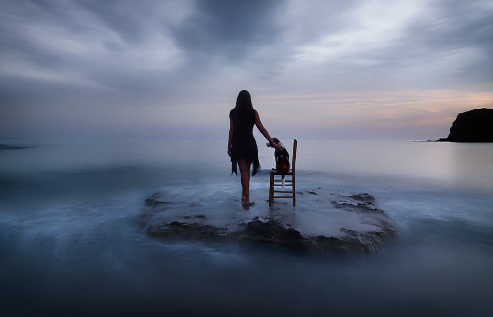 Woman by Serene Ocean by Maria Kaimaki — canvas wall art