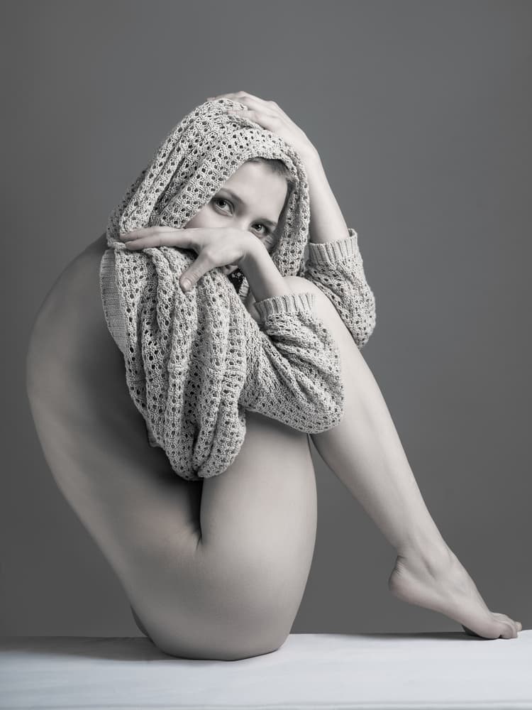 Intimate Knitted Pose by AURIMAS VALEVICIUS — canvas wall art