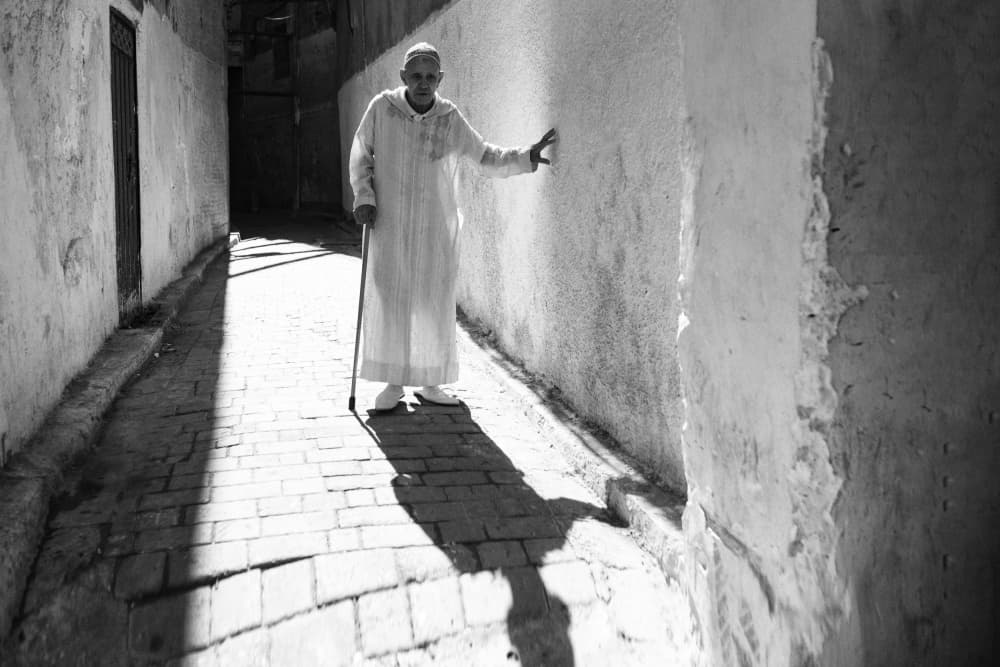 Old Man Sunlight Alley by Bogdan Negoita — canvas wall art