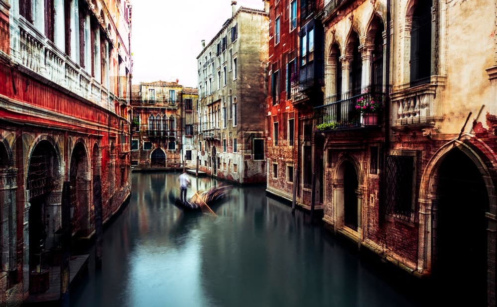 Moody Venice Canal Ride by Carmine Chiriacò — canvas wall art
