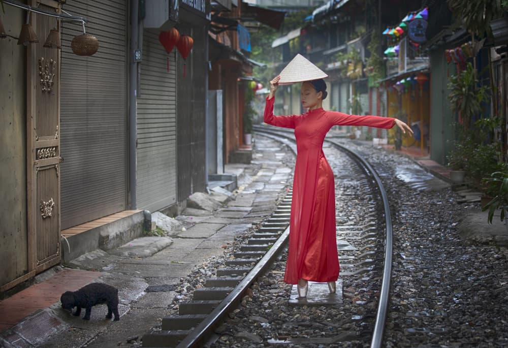 Red Dress Railway Dance by Angela Muliani Hartojo — canvas wall art