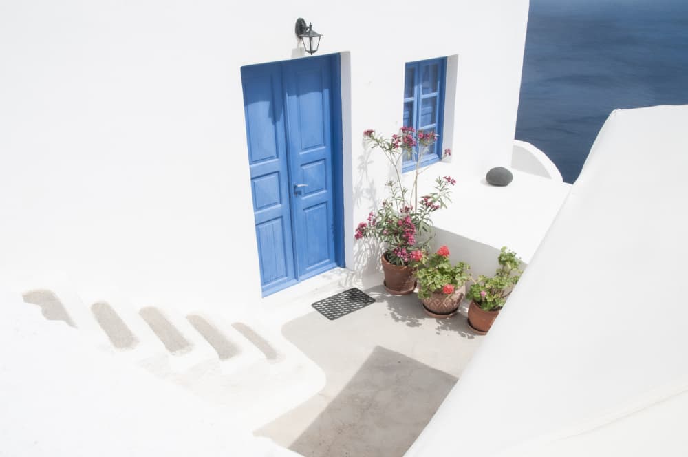 Santorini Blue Door by Linda Wride — canvas wall art