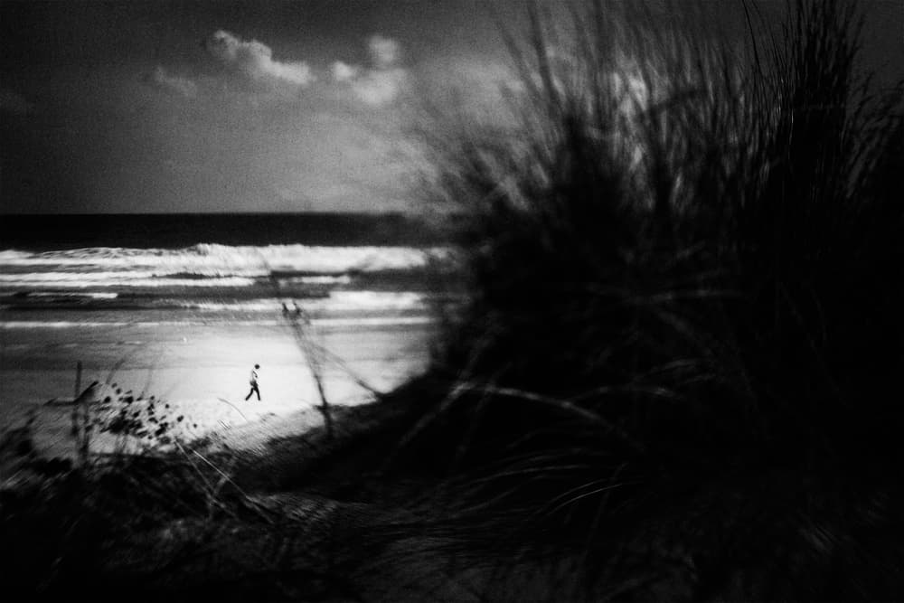 Moody Beach Walker by Laura Mexia — canvas wall art