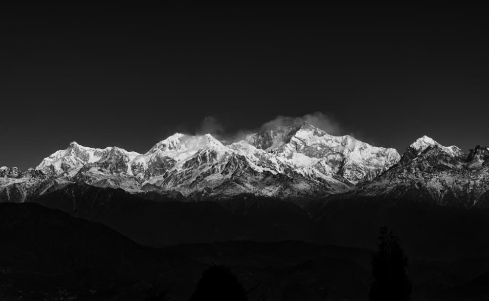 Dramatic Snow Capped Peaks by Avijit Sheel — canvas wall art