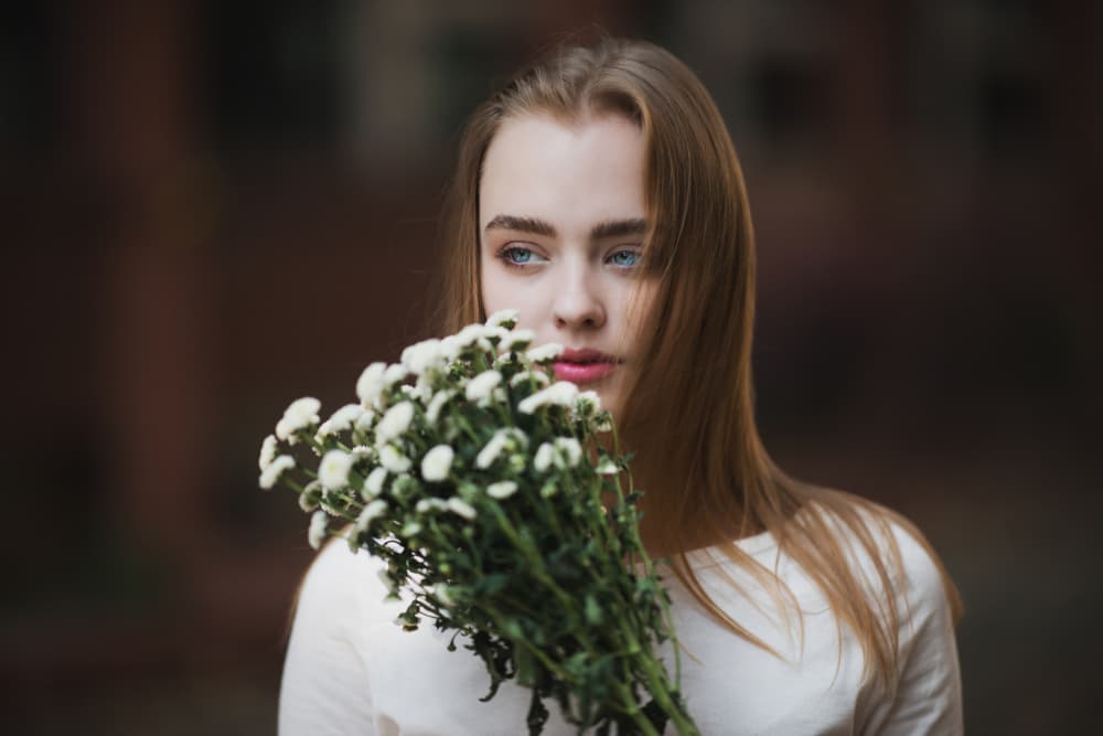 Thoughtful Woman with Flowers by Alexey Zhukov — canvas wall art