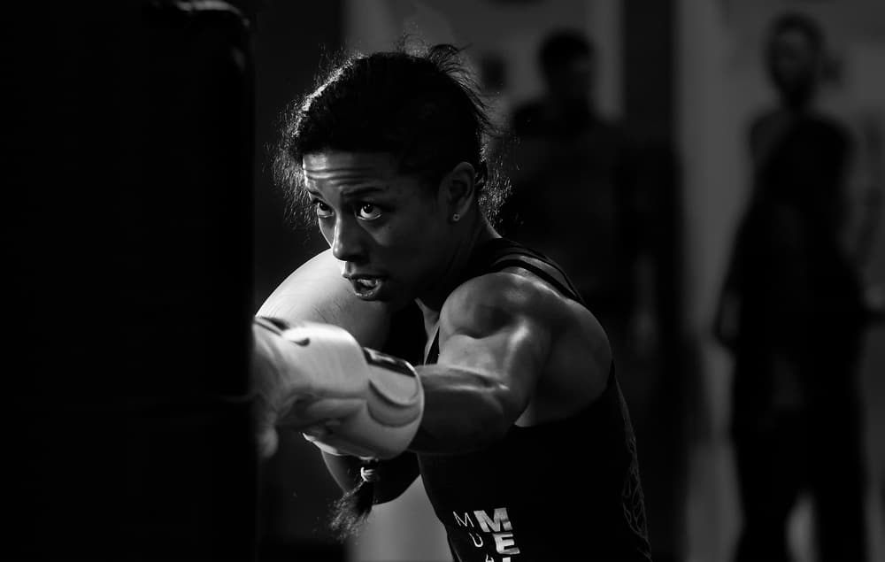 Intense Boxing Woman by Henry Zhao — canvas wall art